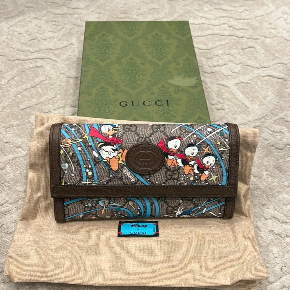 Gucci Disney wallet.